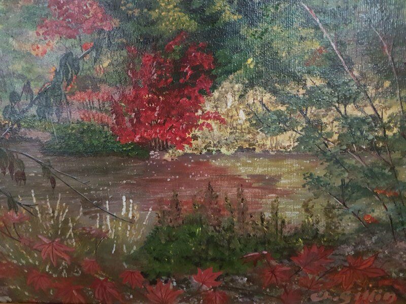 Tableau peint par une paroissienne qui représente un cours d'eau et une nature riche en couleurs